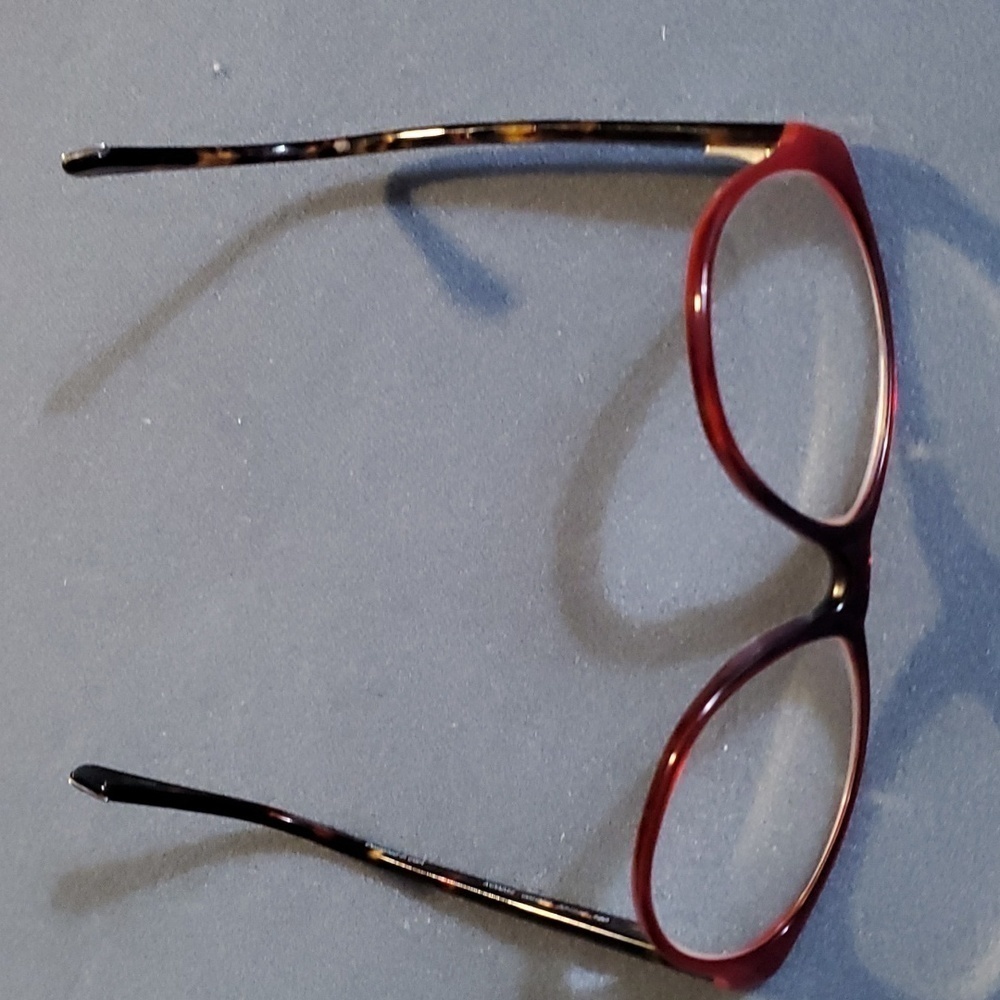 KENITH COLEEYE Glasses .red and brownish. Designed in‎ USA.